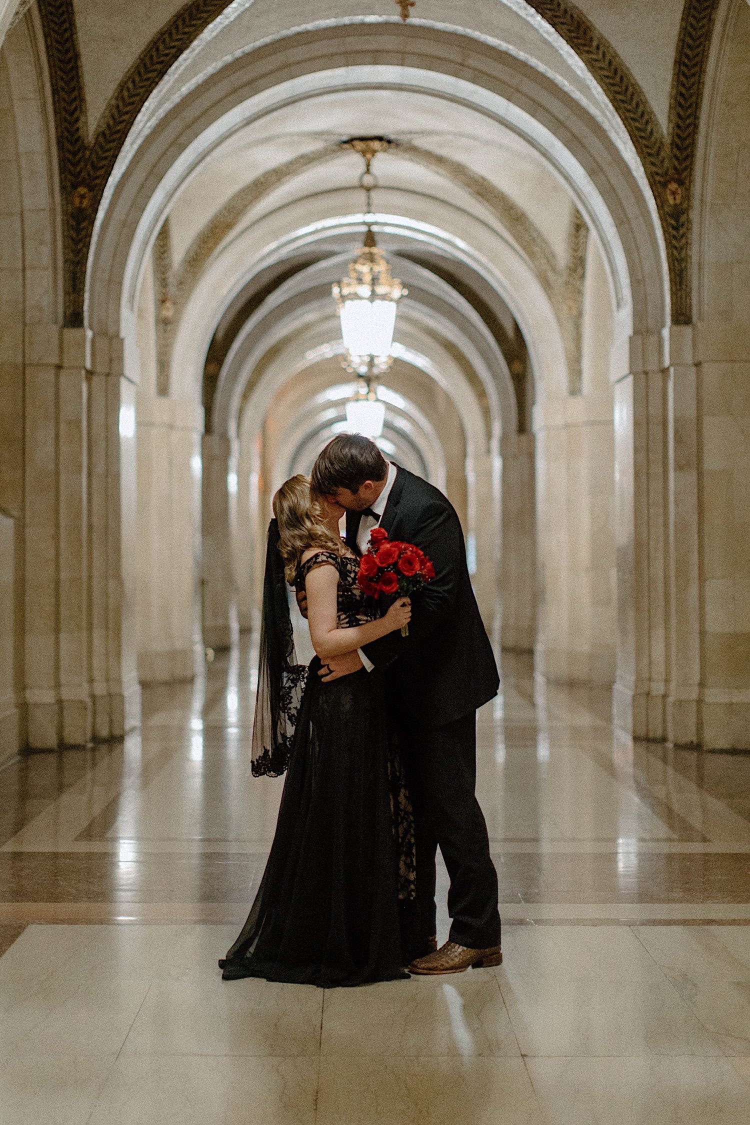 Couple kisses after elopement at Chicago City Hall