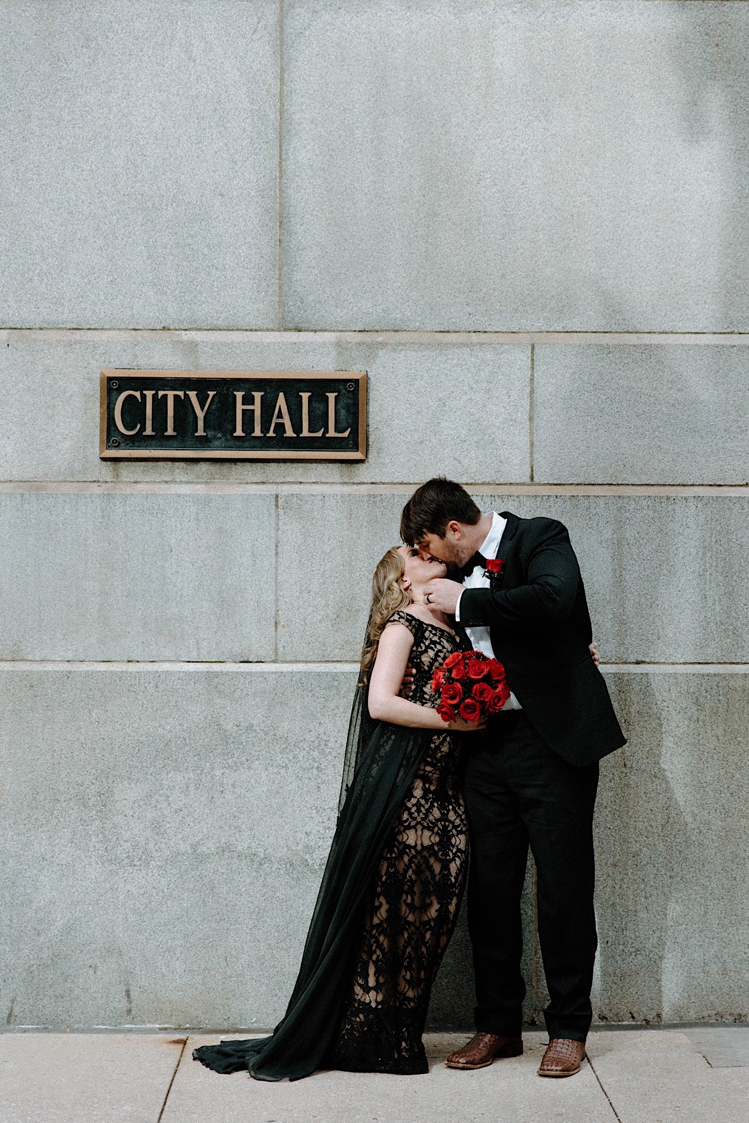 Couple kisses outside Chicago City Hall after elopement