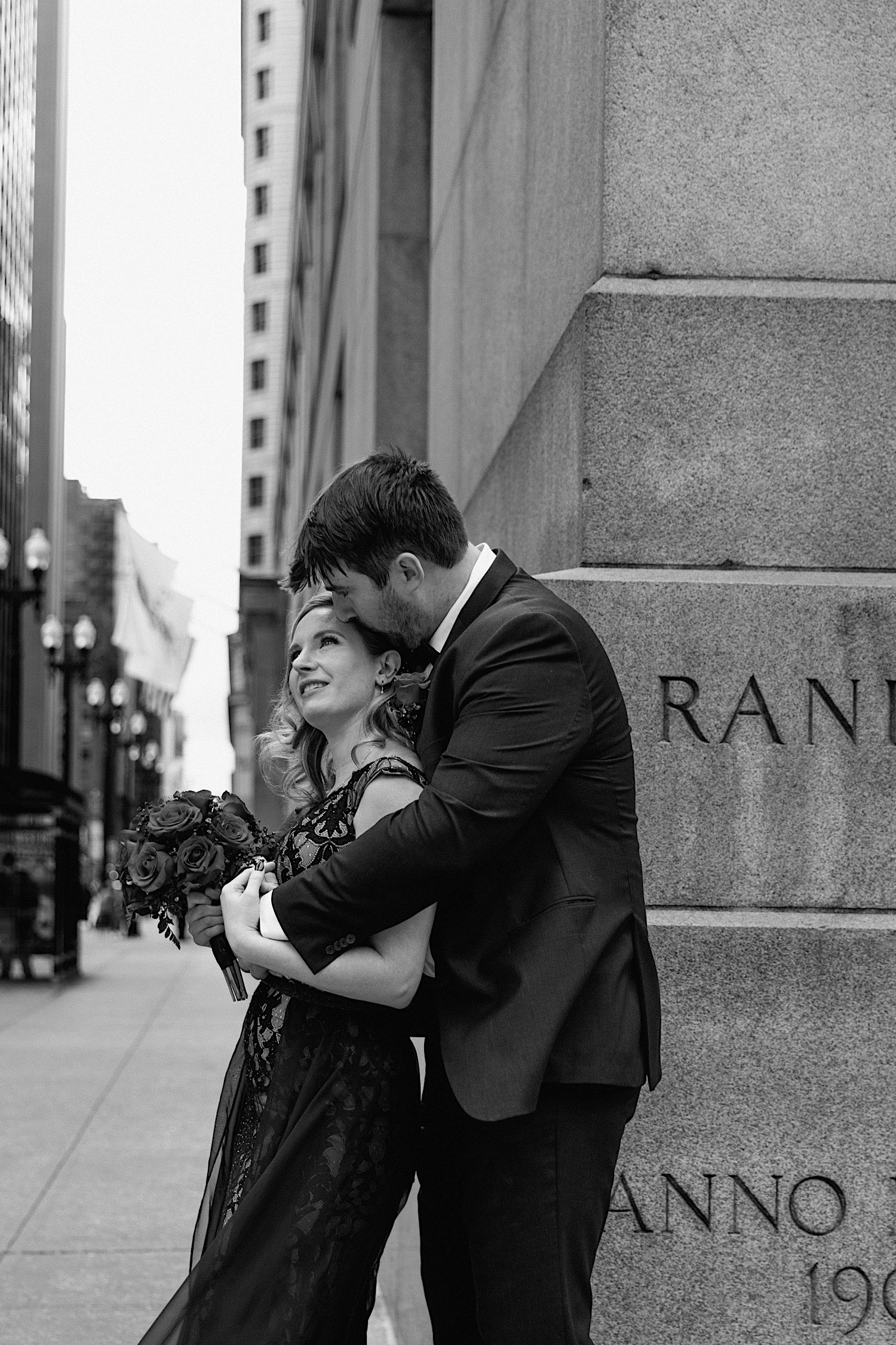 Couple hug outside Chicago City Hall after elopement