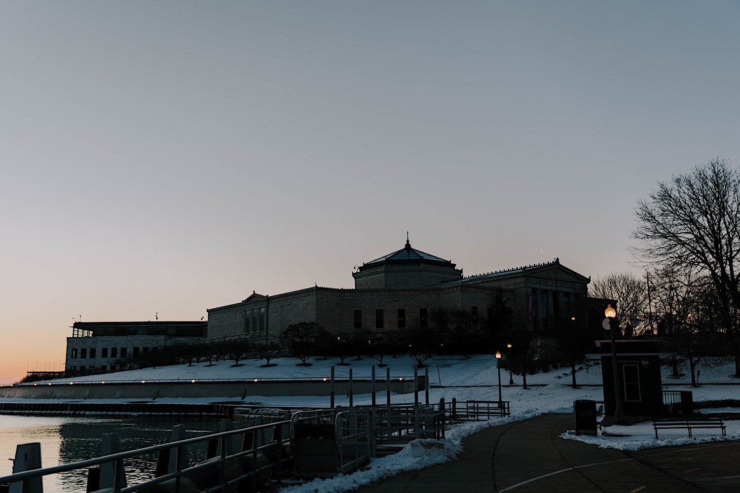 Chicago Planetarium surrounded by snow at sunrise